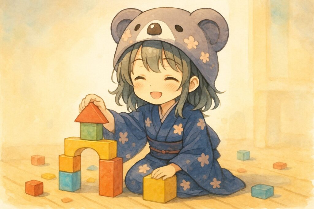 色も形もバラバラな積み木を、鼻歌でも歌いながら楽しそうに積んでいる心愛。完璧ではないが、彼女らしいユニークで温かみのある作品が出来上がっている。